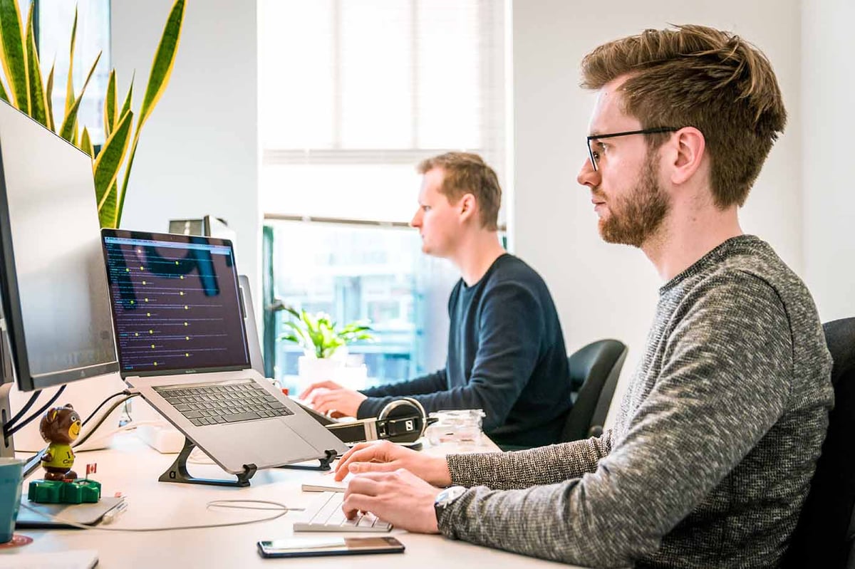 two-coders-working-1400px
